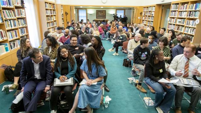 Attendees engaging in dialogue at the 2024 Ikeda Forum