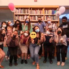 Ikeda Center Youth Committee group photo silly face at the Ikeda Center in 2022