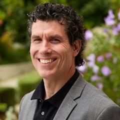 Headshot of Dr. Darren Kew