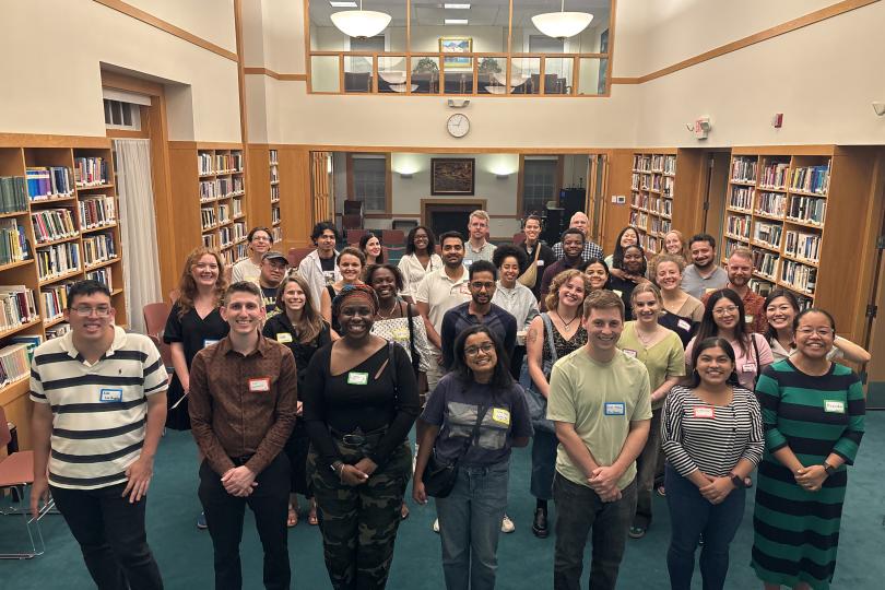 Attendees pose for a group photo at Dialogue Nights
