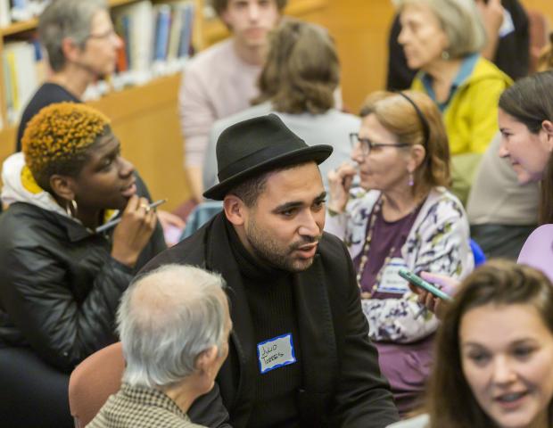 Participants engaging in discussion at the 2019 Ikeda Forum