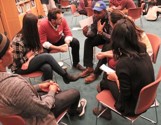 Participants engage in dialogue at Dialogue Nights on the invisible arrow