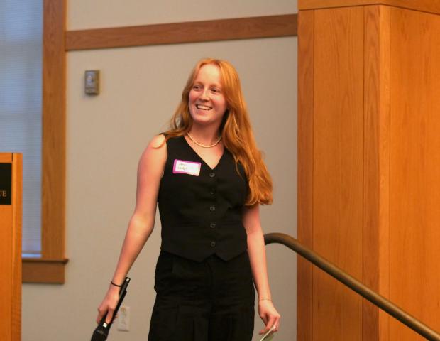 Program intern Sophia speaking at June 2025 Dialogue Nights Lite