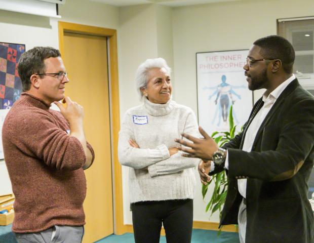 Participants in dialogue during the reception of the 2019 Ikeda Forum