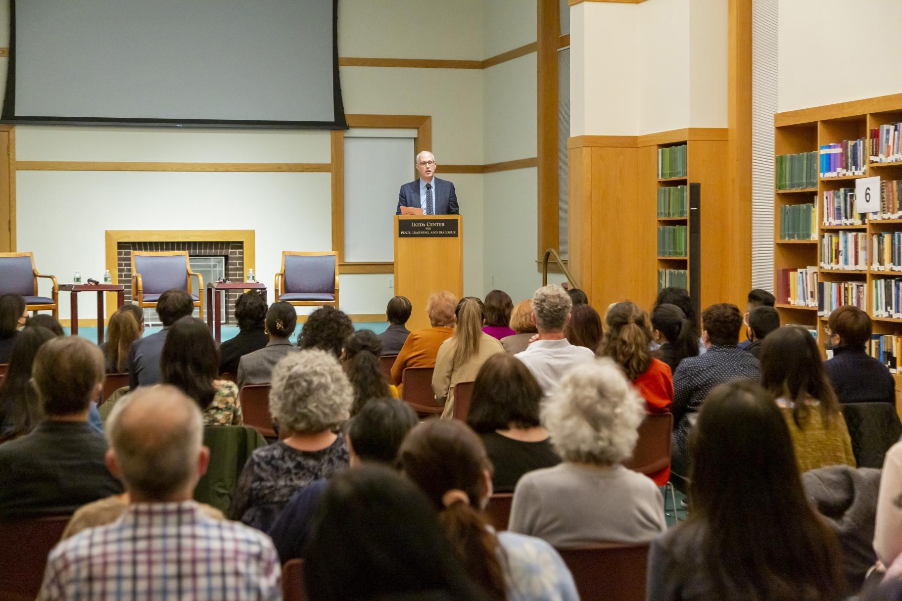 Executive Director Kevin Maher speaking at the 2022 Ikeda Forum