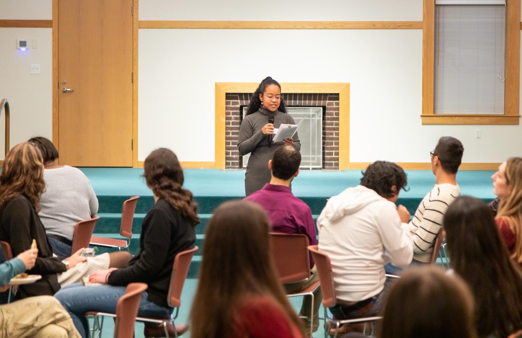 Staff member Preandra facilitating Dialogue Nights