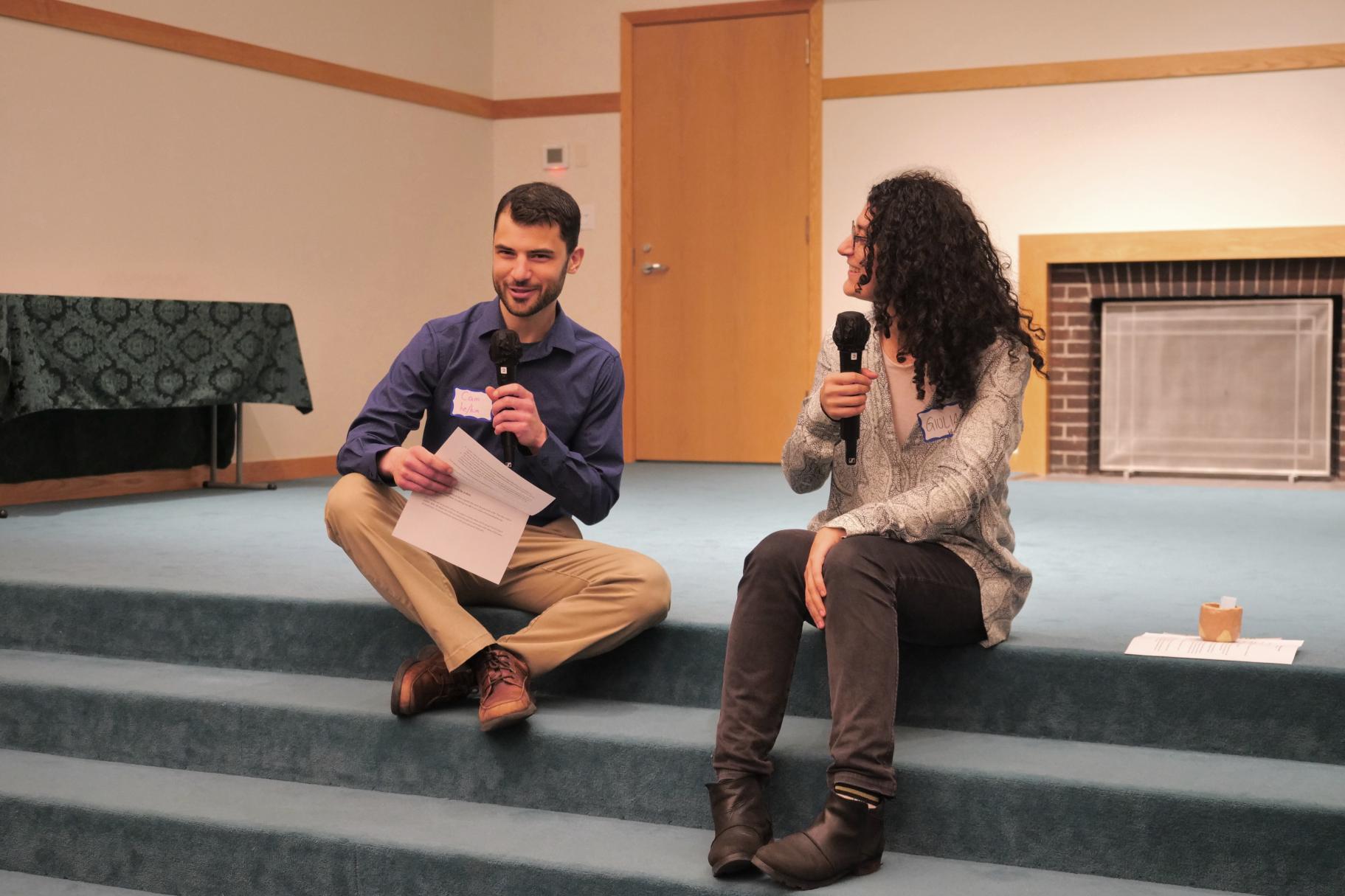 ICYC members Cam and Giulia presenting at the March 2023 Dialogue Nights