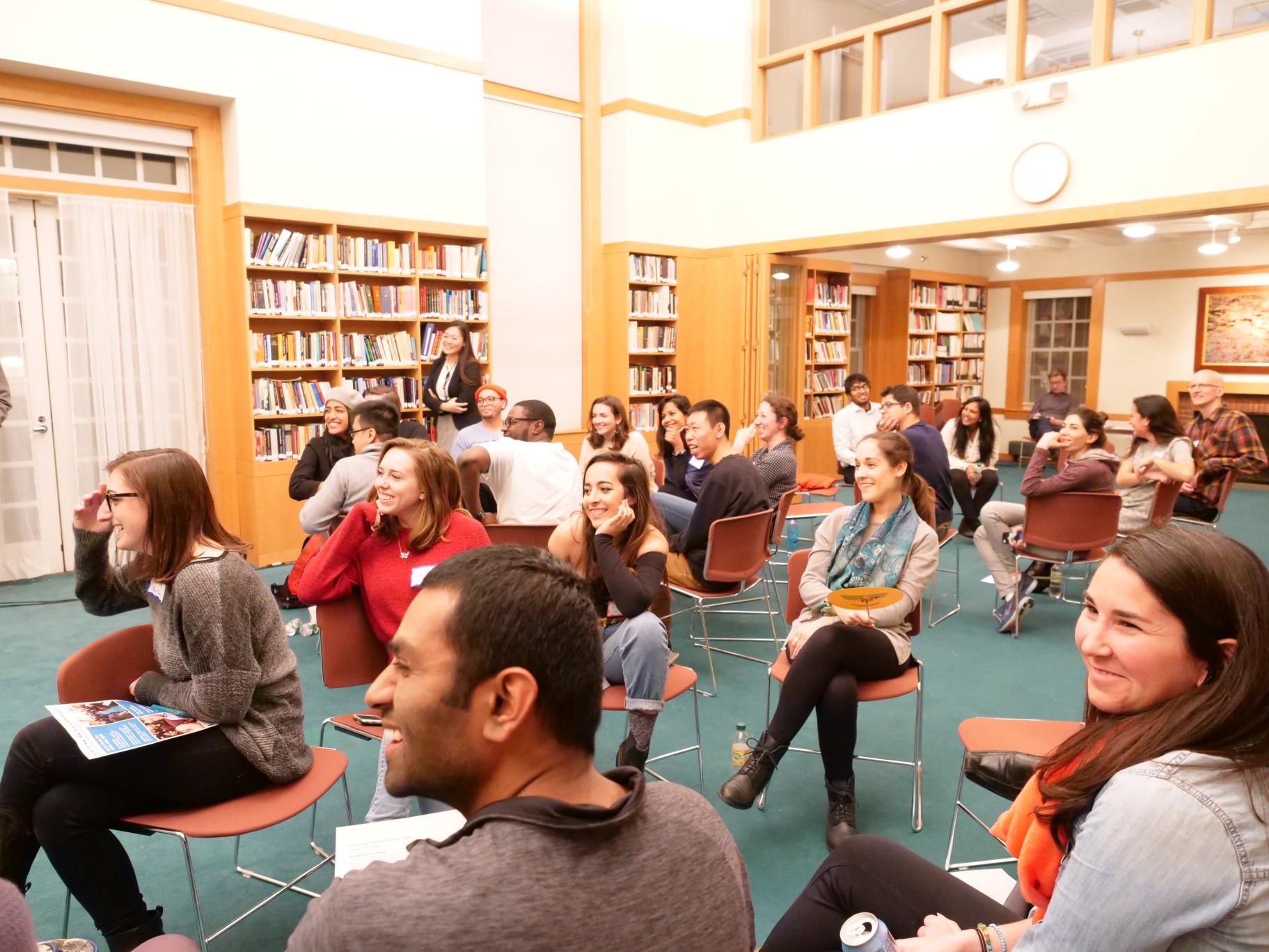 Audience looks on at skits during October 2018 Dialogue Nights 