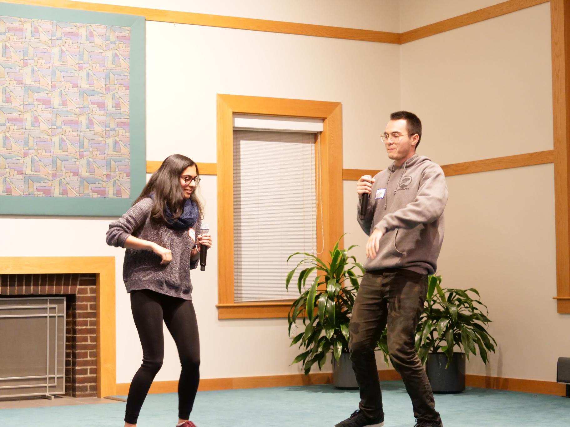 Two participants perform a skit at the October 2018 Dialogue Nights