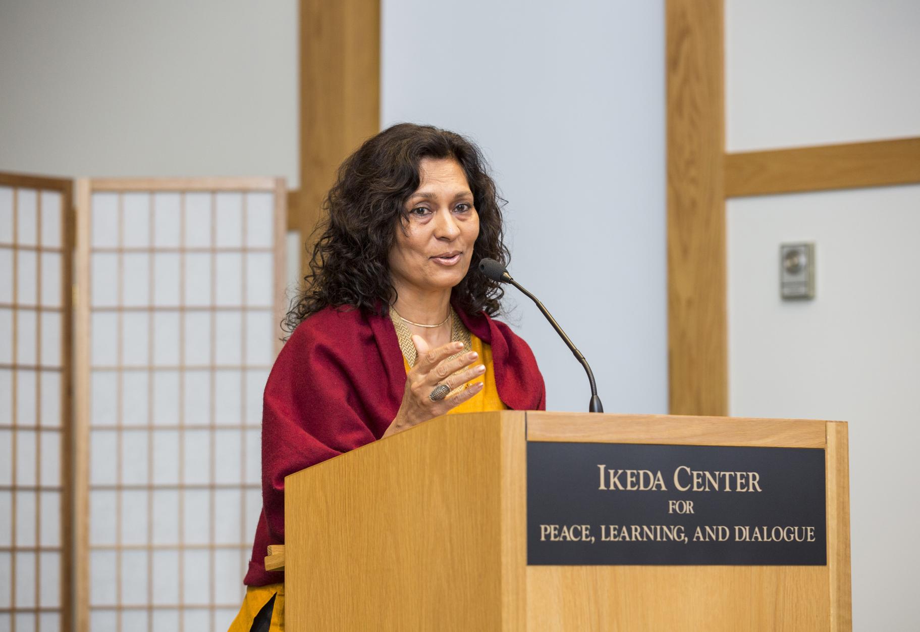 2015 Ikeda Forum speaker Meenakshi Chhabra at the podium
