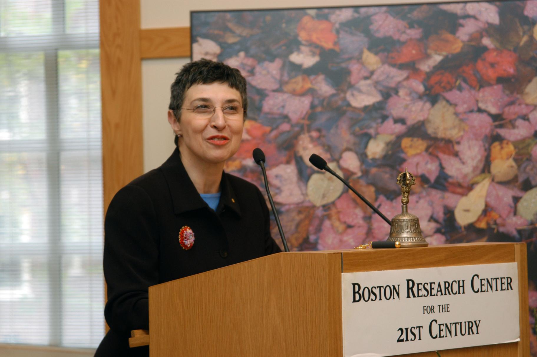2004 Ikeda Forum speaker Paula Miksic speaks at the podium