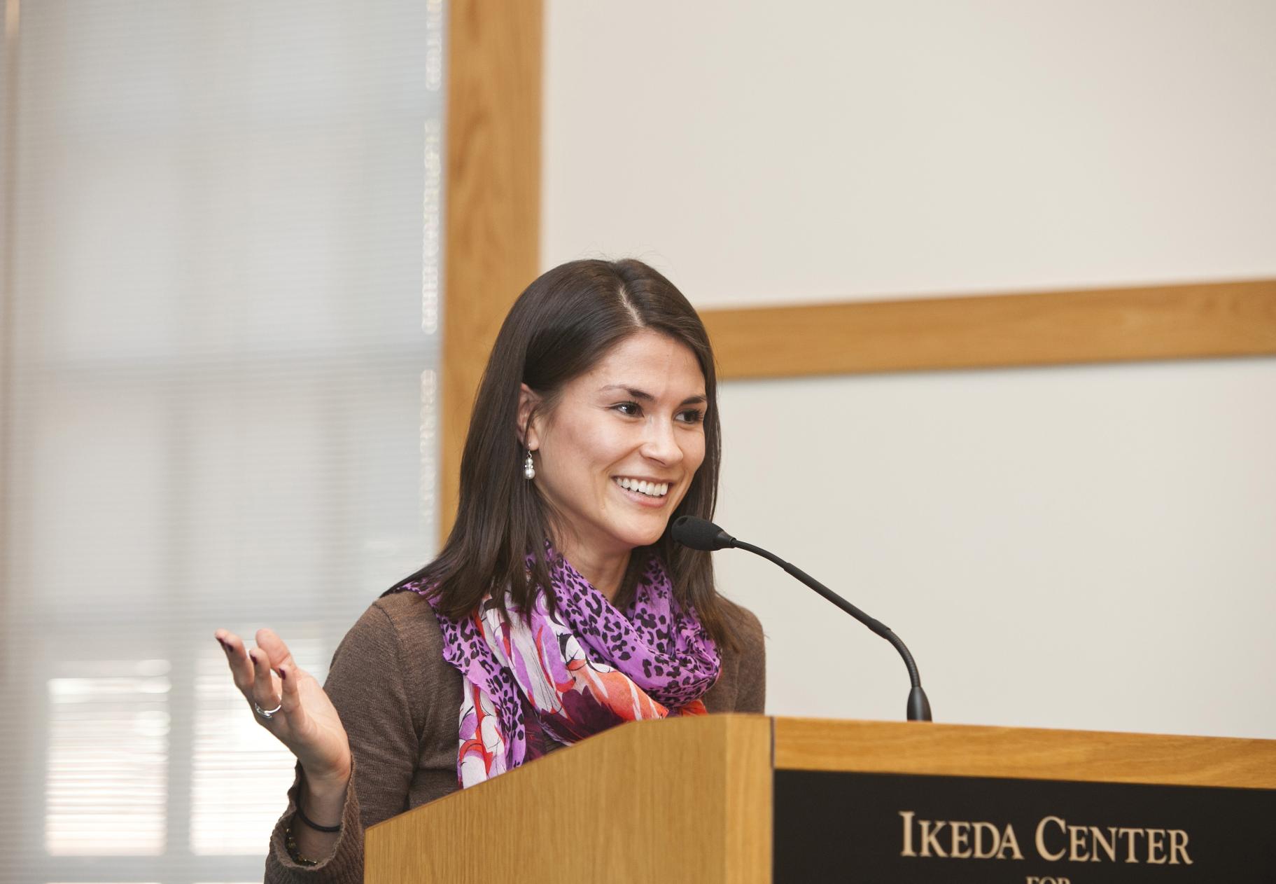 2012 Ikeda Forum moderator Julia Upton speaks at podium